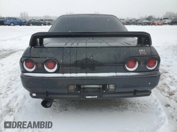 1991 Nissan Skyline z VIN BNR32016641, wystawiony jako Copart lot #87935775 z przebiegiem 166 776 mil mil oraz Szkoda całkowita • Salvage title. Historia ofert i sprzedaży dostępna na DreamBid. Obrazek 6.
