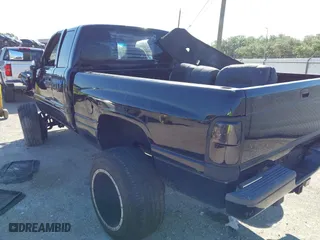 1998 Dodge Ram 1500 with VIN 1B7HF13Z7WJ145413, listed as a IAAI auction lot 42030706 with 198,080 mi miles. Bid and sale history available at carsss.com. Image 3.