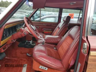1986 Jeep Grand Wagoneer z VIN 1JCNJ15U6GT029563, wystawiony jako Copart lot #78917364 z przebiegiem 115 025 mil mil oraz Szkoda całkowita • Salvage title. Historia ofert i sprzedaży dostępna na DreamBid. Obrazek 7.