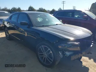 2019 Dodge Charger SXT with VIN 2C3CDXJG4KH710673, listed as a IAAI auction lot 41469797 with 102,011 mi miles and . Bid and sale history available at DreamBid. Image 1.