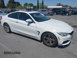 2015 BMW 4 Series 428i with VIN WBA3N7C54FK225367, listed as a IAAI auction lot 41958685 with 142,104 mi miles. Bid and sale history available at carsss.com. Image 1.