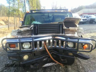 2003 Hummer H2 with VIN 5GRGN23U33H110037, listed as a IAAI auction lot 41339142 with 166,795 mi miles. Bid and sale history available at carsss.com. Image 12.
