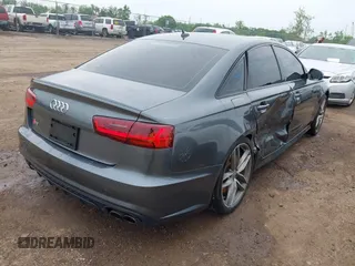 2016 Audi S6 Prestige z VIN WAUH2AFC1GN016187, wystawiony jako IAAI lot #42274744 z przebiegiem 169 821 mil mil oraz . Historia ofert i sprzedaży dostępna na DreamBid. Obrazek 4.