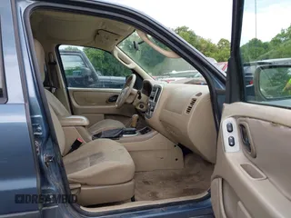 2005 Ford Escape XLT with VIN 1FMYU03165KD74390, listed as a IAAI auction lot 42799963 with 262,762 mi miles and . Bid and sale history available at DreamBid. Image 5.