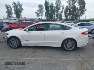 2013 Ford Fusion Titanium Hybrid with VIN 3FA6P0RUXDR386675, listed as a IAAI auction lot 42013986 with 89,349 mi miles. Bid and sale history available at carsss.com. Image 15.