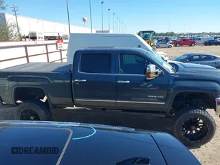 2018 GMC Sierra 2500HD SLT with VIN 1GT12TEY8JF139452, listed as a IAAI auction lot 41253932 with 202,672 mi miles. Bid and sale history available at carsss.com. Image 13.