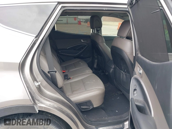 2014 Hyundai Santa Fe with VIN 5XYZU3LB2EG155127, listed as a IAAI auction lot 41864518 with Not provided miles and . Bid and sale history available at DreamBid. Image 8.