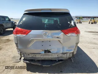 2012 Toyota Sienna with VIN 5TDZK3DC8CS246285, listed as a Copart auction lot 61676185 with 114,700 mi miles and Salvage title. Bid and sale history available at DreamBid. Image 6.