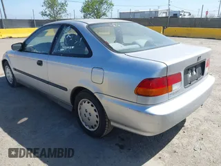 1997 Honda Civic DX with VIN 1HGEJ6220VL106203, listed as a IAAI auction lot 42098813 with 192,343 mi miles. Bid and sale history available at carsss.com. Image 3.