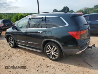 2018 Honda Pilot Elite with VIN 5FNYF6H03JB019900, listed as a Copart auction lot 57497235 with 60,358 mi miles and Salvage title. Bid and sale history available at DreamBid. Image 2.