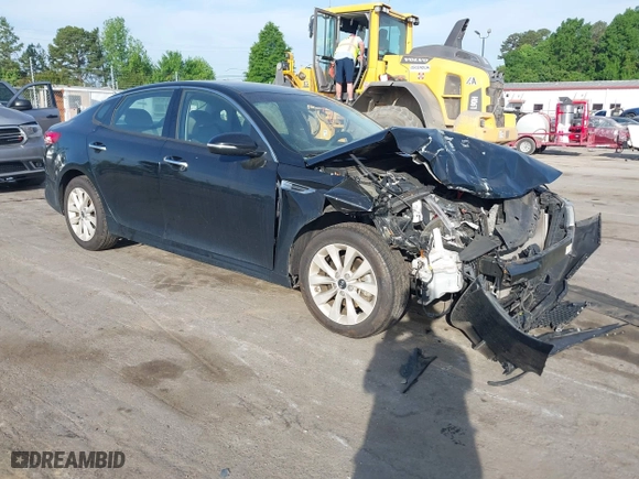 2016 Kia Optima EX with VIN 5XXGU4L3XGG033323, listed as a IAAI auction lot 42088998 with 134,686 mi miles. Bid and sale history available at carsss.com. Image 1.