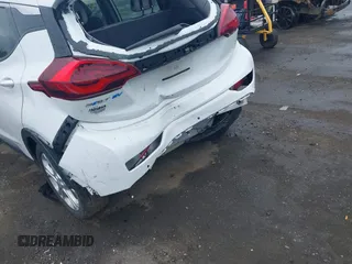 2021 Chevrolet Bolt EV LT z VIN 1G1FY6S05M4101349, wystawiony jako IAAI lot #42362226 z przebiegiem 47 005 mil mil oraz . Historia ofert i sprzedaży dostępna na DreamBid. Obrazek 6.