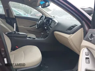 2014 Kia Optima LX z VIN 5XXGM4A73EG270576, wystawiony jako IAAI lot #42335343 z przebiegiem 207 000 mil mil oraz . Historia ofert i sprzedaży dostępna na DreamBid. Obrazek 5.