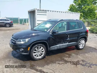 2012 Volkswagen Tiguan SE z VIN WVGBV7AX1CW548133, wystawiony jako IAAI lot #42403164 z przebiegiem 139 083 mil mil oraz . Historia ofert i sprzedaży dostępna na DreamBid. Obrazek 14.