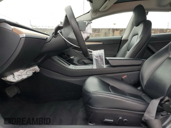 2021 Tesla Model 3 Standard Range Plus z VIN 5YJ3E1EA9MF017537, wystawiony jako Copart lot #55421165 z przebiegiem 40 681 mil mil oraz Szkoda całkowita • Salvage title. Historia ofert i sprzedaży dostępna na DreamBid. Obrazek 7.