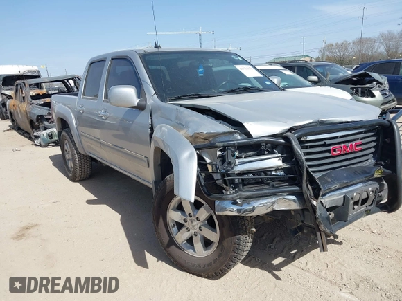 2010 GMC Canyon SLE1 z VIN 1GTJSCDEXA8130361, wystawiony jako IAAI lot #41734671 z przebiegiem 52 621 mil mil oraz . Historia ofert i sprzedaży dostępna na DreamBid. Obrazek 1.