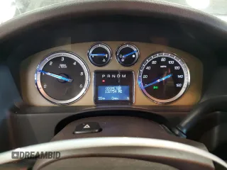 2011 Cadillac Escalade Platinum Edition z VIN 1GYS4DEF6BR193040, wystawiony jako Copart lot #56910155 z przebiegiem 132 754 mil mil oraz Szkoda całkowita • Salvage title. Historia ofert i sprzedaży dostępna na DreamBid. Obrazek 9.