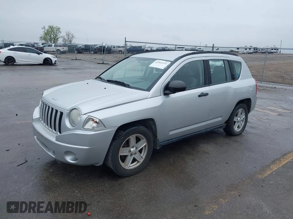 2007 Jeep Compass Sport with VIN 1J8FF47W77D278643, listed as a IAAI auction lot 42161111 with 164,805 mi miles and . Bid and sale history available at carsss.com. Image 2.