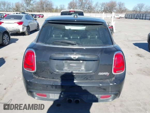 2015 MINI Hardtop 4 Door S with VIN WMWXU3C53F2B56459, listed as a IAAI auction lot 41400624 with 233,850 mi miles and . Bid and sale history available at DreamBid. Image 16.