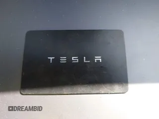 2021 Tesla Model 3 Long Range with VIN 5YJ3E1EBXMF990242, listed as a IAAI auction lot 41674222 with 24,554 mi miles and . Bid and sale history available at DreamBid. Image 11.