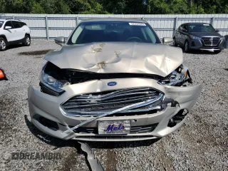 2015 Ford Fusion SE Hybrid z VIN 3FA6P0LU7FR102723, wystawiony jako Copart lot #62334345 z przebiegiem 136 341 mil mil oraz Nie do naprawy • Non repairable. Historia ofert i sprzedaży dostępna na DreamBid. Obrazek 5.