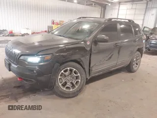 2020 Jeep Cherokee Trailhawk z VIN 1C4PJMBX8LD627104, wystawiony jako IAAI lot #41493732 z przebiegiem 46 463 mil mil oraz . Historia ofert i sprzedaży dostępna na DreamBid. Obrazek 18.