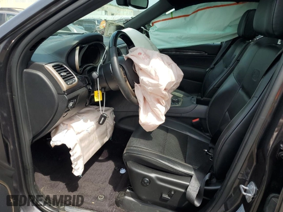 2017 Jeep Grand Cherokee Overland z VIN 1C4RJFCG2HC913434, wystawiony jako Copart lot #56580955 z przebiegiem 86 358 mil mil oraz Szkoda całkowita • Salvage title. Historia ofert i sprzedaży dostępna na DreamBid. Obrazek 7.