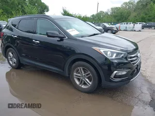 2017 Hyundai Santa Fe 2.4L z VIN 5XYZUDLBXHG400959, wystawiony jako IAAI lot #42125508 z przebiegiem 141 096 mil mil oraz . Historia ofert i sprzedaży dostępna na DreamBid. Obrazek 1.