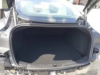 2025 Tesla Model 3 Long Range with VIN 5YJ3E1EA7SF940208, listed as a IAAI auction lot 42433793 with 1,983 mi miles and . Bid and sale history available at DreamBid. Image 21.