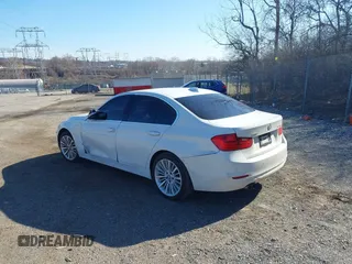 2014 BMW 3 Series 328i xDrive with VIN WBA3B5C59EP540292, listed as a IAAI auction lot 41761916 with 170,819 mi miles. Bid and sale history available at carsss.com. Image 3.