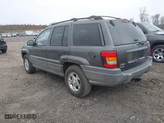 2002 Jeep Grand Cherokee Laredo with VIN 1J4GW48N62C194372, listed as a IAAI auction lot 42007468 with 172,792 mi miles. Bid and sale history available at carsss.com. Image 3.