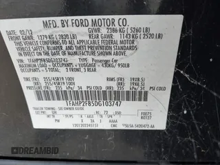 2013 Ford Taurus Limited z VIN 1FAHP2F85DG103747, wystawiony jako IAAI lot #42763099 z przebiegiem 181 891 mil mil oraz . Historia ofert i sprzedaży dostępna na DreamBid. Obrazek 9.