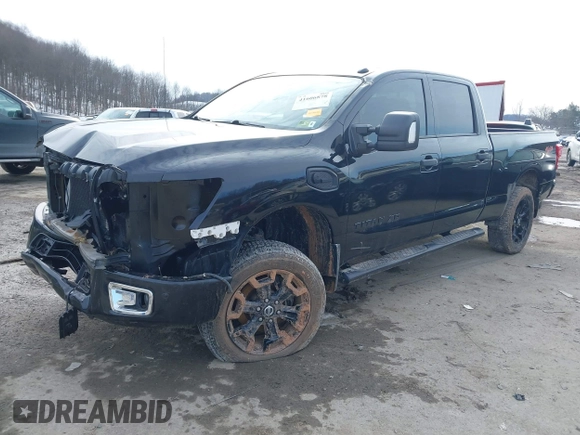 2018 Nissan Titan XD SV with VIN 1N6BA1F49JN521838, listed as a IAAI auction lot 41606878 with 143,742 mi miles. Bid and sale history available at carsss.com. Image 2.