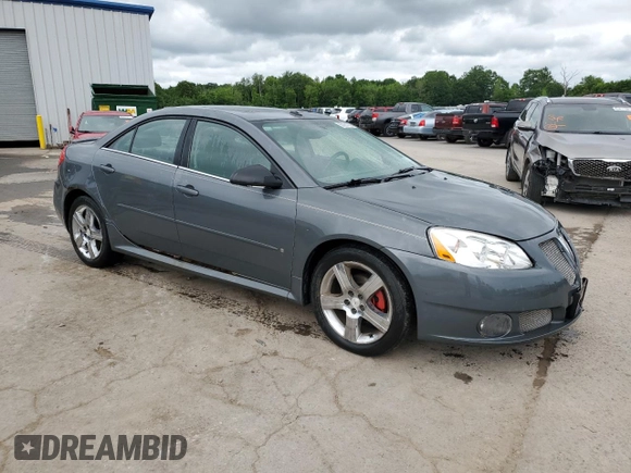 2009 Pontiac G6 GXP 1SA with VIN 1G2ZM577294217264, listed as a Copart auction lot 63824735 with 165,948 mi miles and Salvage title. Bid and sale history available at DreamBid. Image 4.