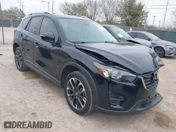 2016 Mazda CX-5 Grand Touring with VIN JM3KE2DY0G0651300, listed as a IAAI auction lot 41678833 with 98,790 mi miles. Bid and sale history available at carsss.com. Image 1.