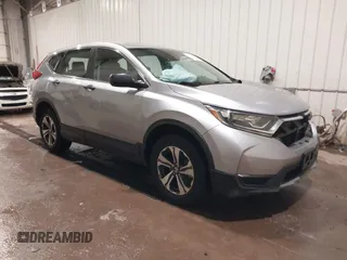 2019 Honda CR-V LX z VIN 5J6RW6H35KL001664, wystawiony jako IAAI lot #41001458 z przebiegiem 87 589 mil mil oraz . Historia ofert i sprzedaży dostępna na DreamBid. Obrazek 1.