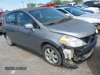 2012 Nissan Versa S with VIN 3N1BC1CP1CK287704, listed as a IAAI auction lot 41894009 with 107,582 mi miles. Bid and sale history available at carsss.com. Image 1.