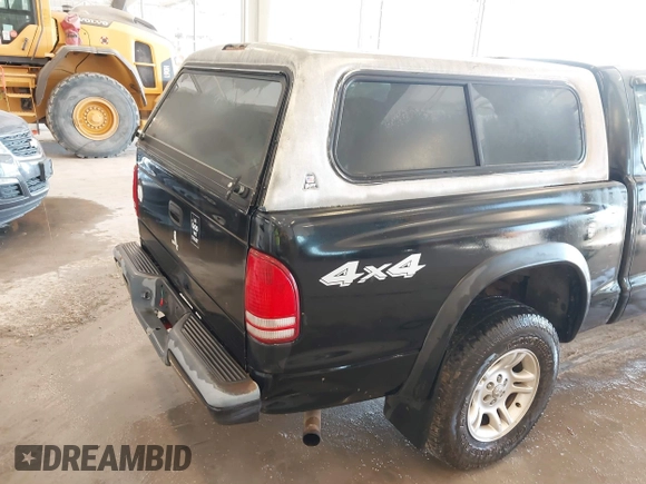 2004 Dodge Dakota Sport with VIN 1D7HG38N24S501391, listed as a IAAI auction lot 41736751 with 213,299 mi miles and . Bid and sale history available at carsss.com. Image 12.