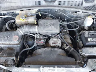 2002 Jeep Liberty Sport with VIN 1J4GL48K32W145174, listed as a IAAI auction lot 42028324 with 291,896 mi miles. Bid and sale history available at carsss.com. Image 10.
