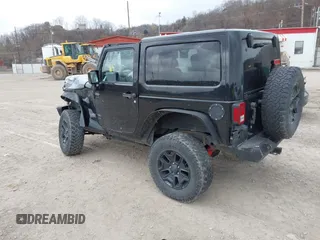 2014 Jeep Wrangler Sahara with VIN 1C4AJWBG9EL311477, listed as a IAAI auction lot 41884255 with 82,221 mi miles and . Bid and sale history available at carsss.com. Image 3.
