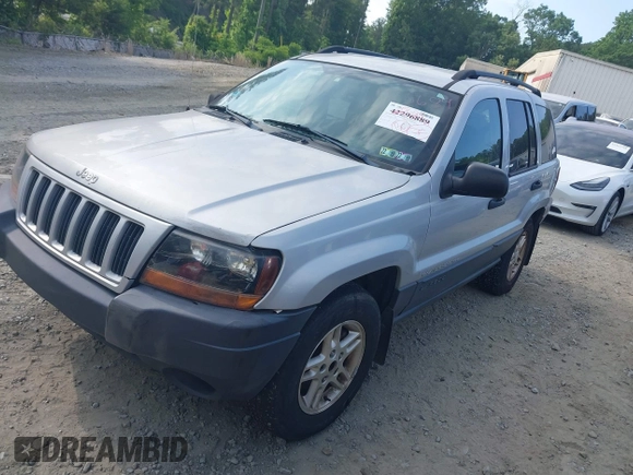 2004 Jeep Grand Cherokee Laredo z VIN 1J4GW48S54C106405, wystawiony jako IAAI lot #42315689 z przebiegiem 104 416 mil mil oraz . Historia ofert i sprzedaży dostępna na DreamBid. Obrazek 2.