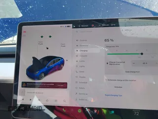 2019 Tesla Model 3 Long Range with VIN 5YJ3E1EB7KF454636, listed as a IAAI auction lot 41853972 with 56,916 mi miles. Bid and sale history available at carsss.com. Image 18.