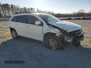 2013 Dodge Journey SXT with VIN 3C4PDCBG7DT689297, listed as a Copart auction lot 47303385 with 129,120 mi miles and Salvage Title. Bid and sale history available at carsss.com. Image 4.