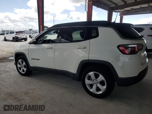 2019 Jeep Compass Altitude with VIN 3C4NJCBB0KT637477, listed as a Copart auction lot 57751005 with 94,316 mi miles and Clean title. Bid and sale history available at DreamBid. Image 2.