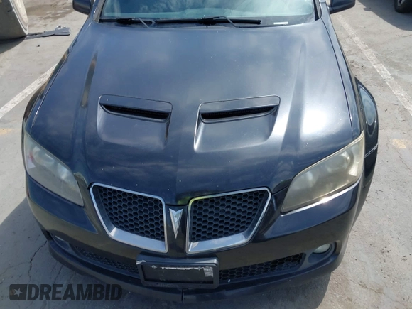 2008 Pontiac G8 GT with VIN 6G2EC57Y18L136838, listed as a IAAI auction lot 42034754 with 152,980 mi miles. Bid and sale history available at carsss.com. Image 6.