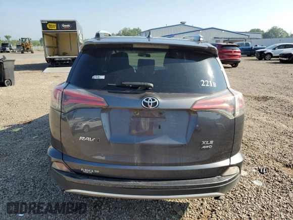 2016 Toyota RAV4 XLE with VIN JTMRFREV0GJ082234, listed as a Copart auction lot 64941855 with 193,270 mi miles and Salvage title. Bid and sale history available at DreamBid. Image 6.