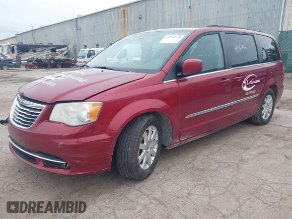 2014 Chrysler Town & Country Touring with VIN 2C4RC1BG0ER211128, listed as a IAAI auction lot 41960992 with 133,055 mi miles and . Bid and sale history available at DreamBid. Image 2.