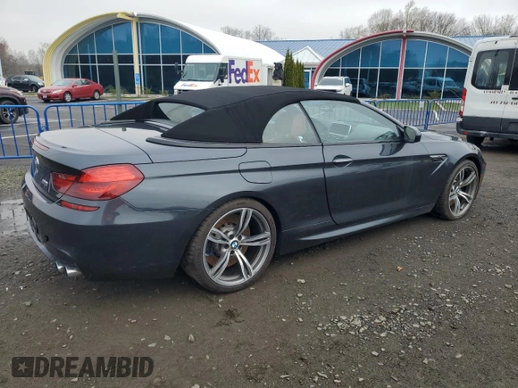 2013 BMW M6 z VIN WBSLZ9C55DDZ77804, wystawiony jako Copart lot #54121185 z przebiegiem 66 286 mil mil oraz Czysty tytuł • Clean title. Historia ofert i sprzedaży dostępna na DreamBid. Obrazek 3.