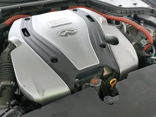 2015 Infiniti Q50 Hybrid Premium z VIN JN1AV7AP1FM790522, wystawiony jako IAAI lot #43198124 z przebiegiem 139 911 mil mil oraz . Historia ofert i sprzedaży dostępna na DreamBid. Obrazek 23.