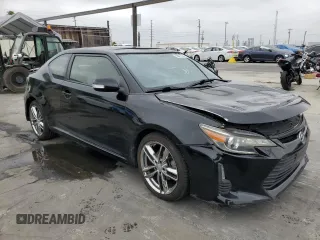 2015 Scion tC z VIN JTKJF5C75F3093123, wystawiony jako Copart lot #58414325 z przebiegiem 107 051 mil mil oraz Szkoda całkowita • Salvage title. Historia ofert i sprzedaży dostępna na DreamBid. Obrazek 4.